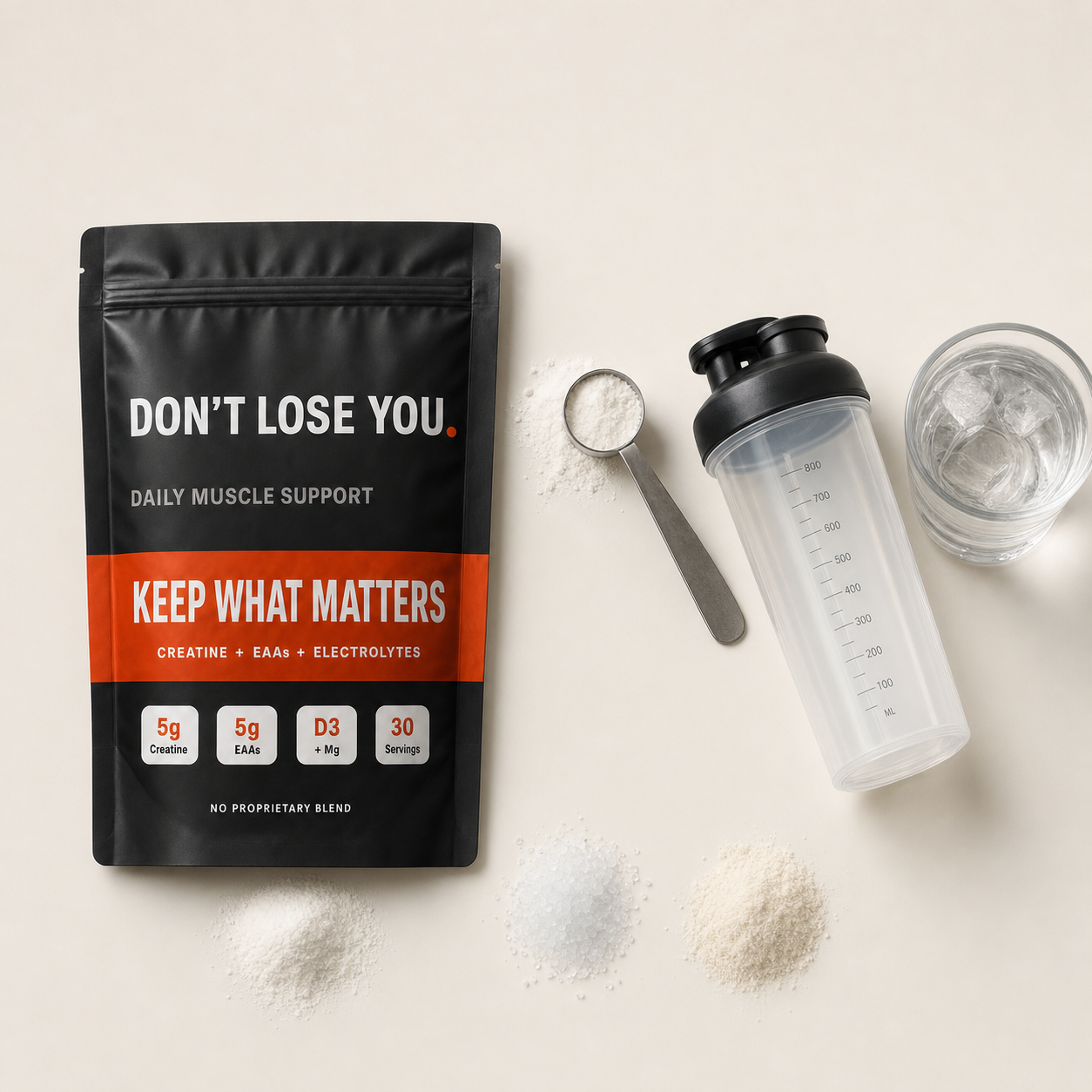 DON'T LOSE YOU formula flatlay showing creatine, EAAs, electrolytes and shaker